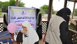 خلال نشاط الهيئة الخيرية مع أهالي الشهداء