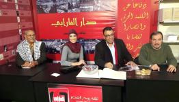الكتاب الأربعة أثناء التوقيع