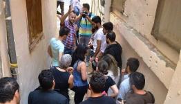 تمشاة في أحد أزقة مخيم برج البراجنة