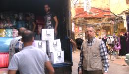 صور توزيع المساعدات في برج البراجنة (2)