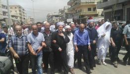  مسيرة حاشدة في البارد   