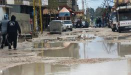 شارع معبد بالحفر والجور في نهر البارد