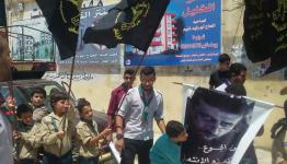  صورة للكشافة اثناء الوقفة التضامنية
