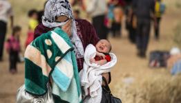 لاجئة فلسطينة نازحة من مخيم اليرموك