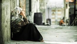 امرأة فلسطينية في أحد المخيمات