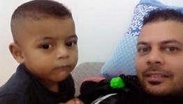 محمد سعدة وطفله