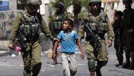 ولد فلسطيني معتقل من قبل قوات الاحتلال