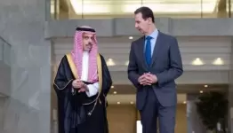 الأسد مستقبلا وزير الخارجية السعودي