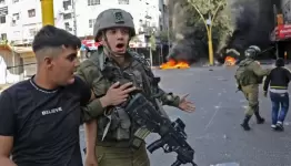 طفل فلسطيني وجندي محتل