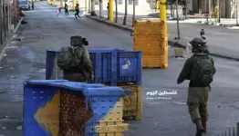 الاحتلال يحطم محتويات محل تجاري
