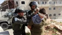 الاحتلال يعتقل 11 فلسطينيا