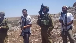 إرهاب بحماية جيش الاحتلال
