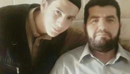 الشهيد مع والده زياد غربية