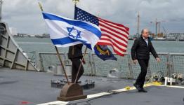 أثناء تفقد وزير الحرب الصهيوني للمساعدات الأمريكية الأخيرة 