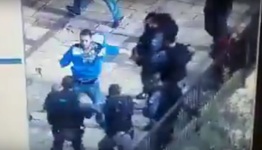 صورة من الفيديو تظهر الشهيد علي يهاجم شرطة العدو 