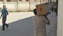 توزيع طرود غذائية