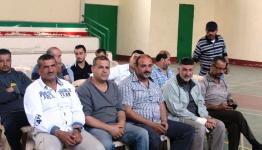 أثناء تكريم العاملين في الصحة البيئة