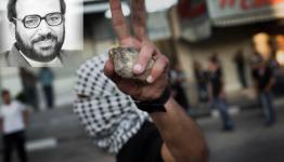 صورة منتفض يظهر خلفه الدكتور فتحي الشقاقي