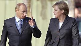 المستشارة الألمانية انجيلا ميركل والرئيس الروسي فلاديمير بوتين