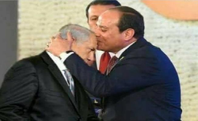 السيسي ونتنياهو.. وقبلة على جبين مجرم الحرب؟!