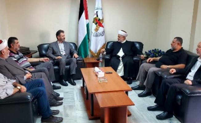 خلال لقاء حركة الجهاد الإسلامي بجبهة العمل الإسلامي