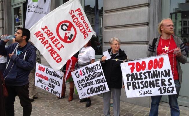 جانب من وقفة احتجاجية لمطالبة شركة G4S بتوقف دعمها للعدو الصهيوني