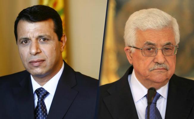 رئيس السلطة الفلسطينية، محمود عباس، والنائب في المجلس التشريعي الفلسطيني، محمد دحلان