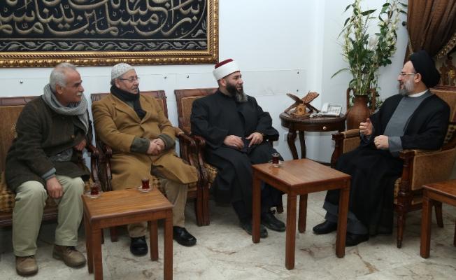 فضل الله خلال استقباله الوفد الفلسطيني 