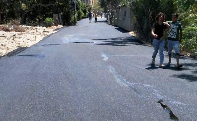 عملية تزفيت الشوارع في الرشيدية