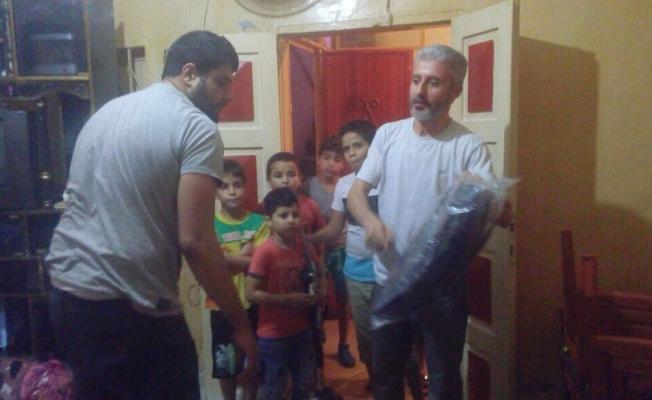 خلال توزيع الشنط المدرسية