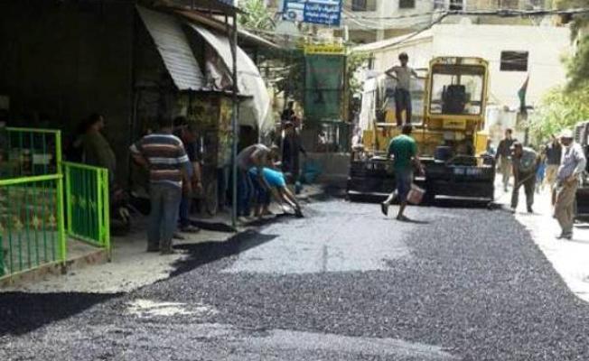 اثناء تزفيت الشارع في البداوي