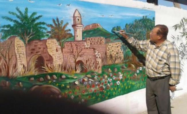 مدن فلسطينية على جدران عين الحلوة