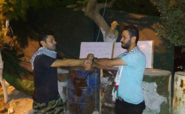الناشطان الفلسطينيان عطية والغزي