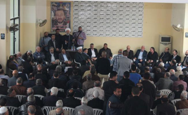 أثناء الحفل التأبيني