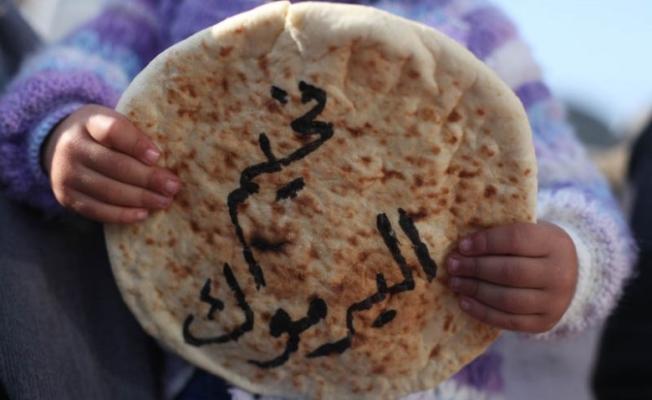 أطفال "اليرموك" بلا خبز