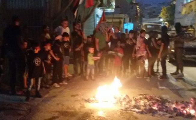 أثتار حرق العلم الإسرائيلي في عين الحلوة
