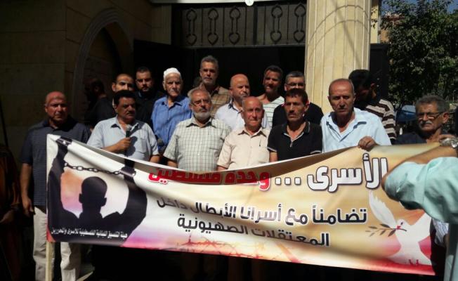 خلال الوقفة التضامنية في مخيم برج البراجنة