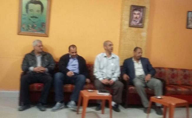 تجمع أسر الشهداء خلال زيارة الشعبية