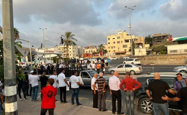 خلال المظاهرة في الطيبة