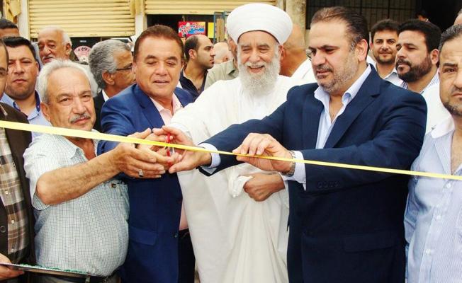 أثناء افتتاح المعرض