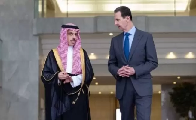 الأسد مستقبلا وزير الخارجية السعودي