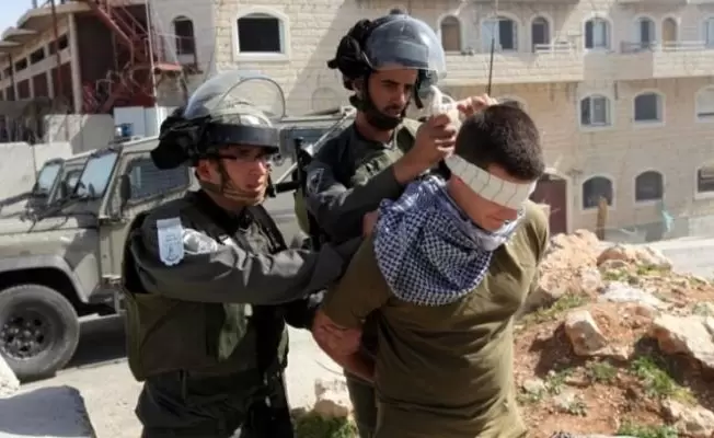 الاحتلال يعتقل 11 فلسطينيا