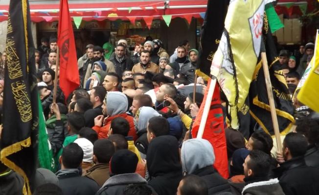 أثناء تشييع حثمان الشهيدة أشرقت 