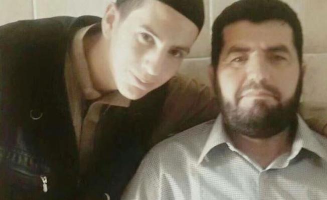 الشهيد مع والده زياد غربية