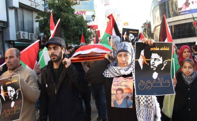 جنازة رمزية للشهيد ملحم في رام الله