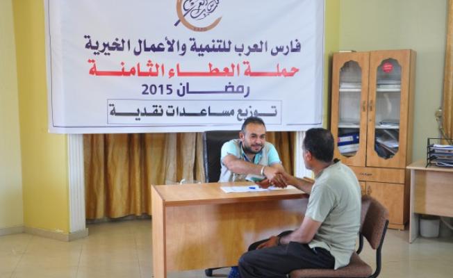 خلال توزيع المساعدات على الأسر المحتاجة