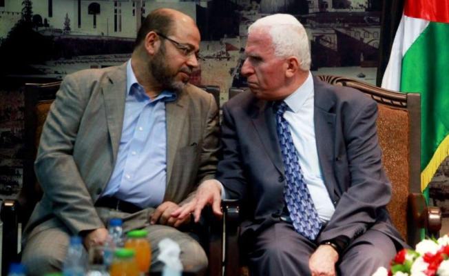 عضو اللجنة المركزية لحركة "فتح" (يميناً) وعضو المكتي السياسي لحركة "حماس"(شمالاً)