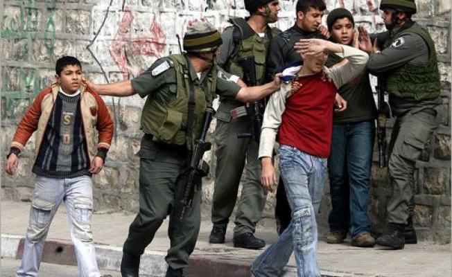 الاحنلال يعتدي ويعتقل الاطفال الفلسطينيين