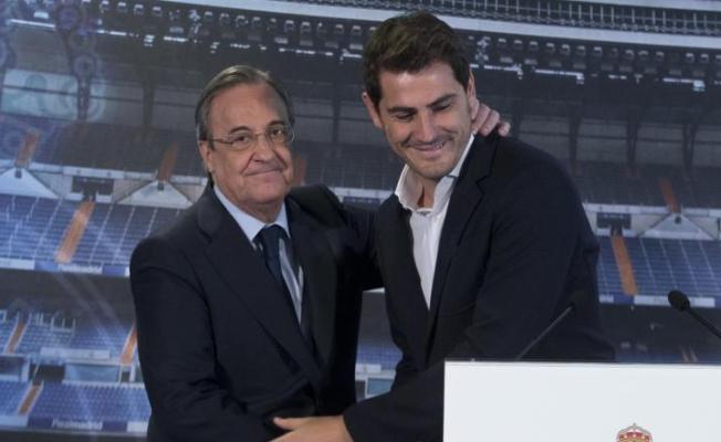 الحارسَ إيكر كاسياس، رئيس ريال مدريد فلورنتينو بيريز