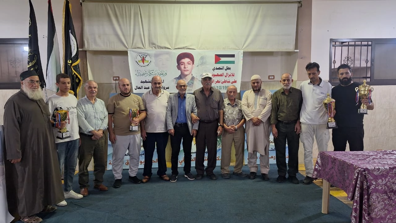 خلال الاحتفال التكريمي في مخيم نهر البارد